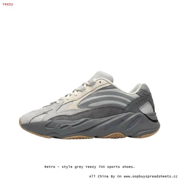Retro - style grey Yeezy 700 sports shoes.