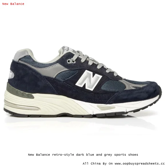 New Balance retro-style dark blue and grey sports shoes
