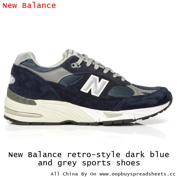 New Balance retro-style dark blue and grey sports shoes