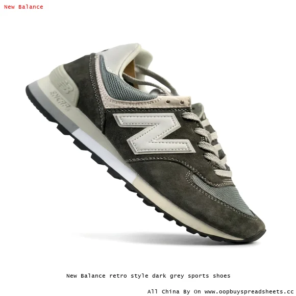 New Balance retro style dark grey sports shoes