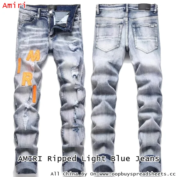 AMIRI Ripped Light Blue Jeans